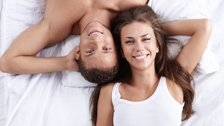 couple-on-bed-159679