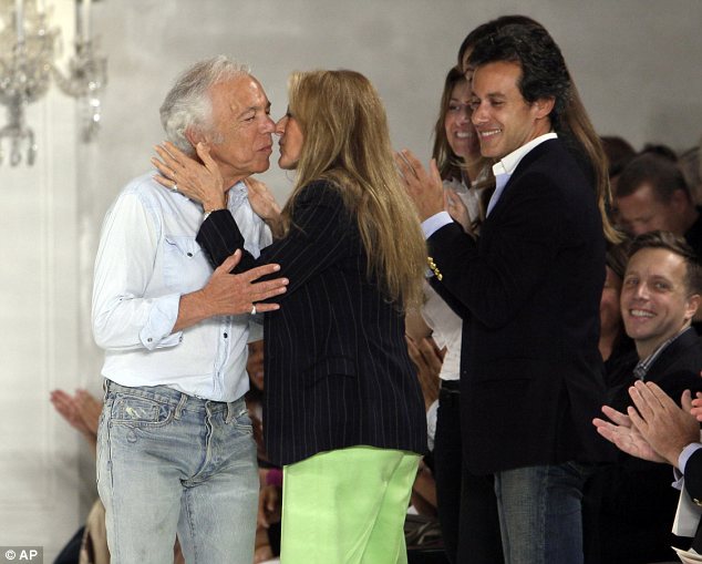 Ralph Lauren's wife congratulates him with a kiss after romantic